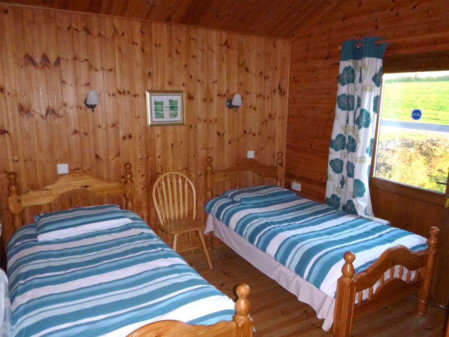 Log Cabins single beds, Adventure Wales accommodation, Accommodation for schools, Accommodation for colleges, Accommodation for team building, Accomodation for Stag and Hen parties