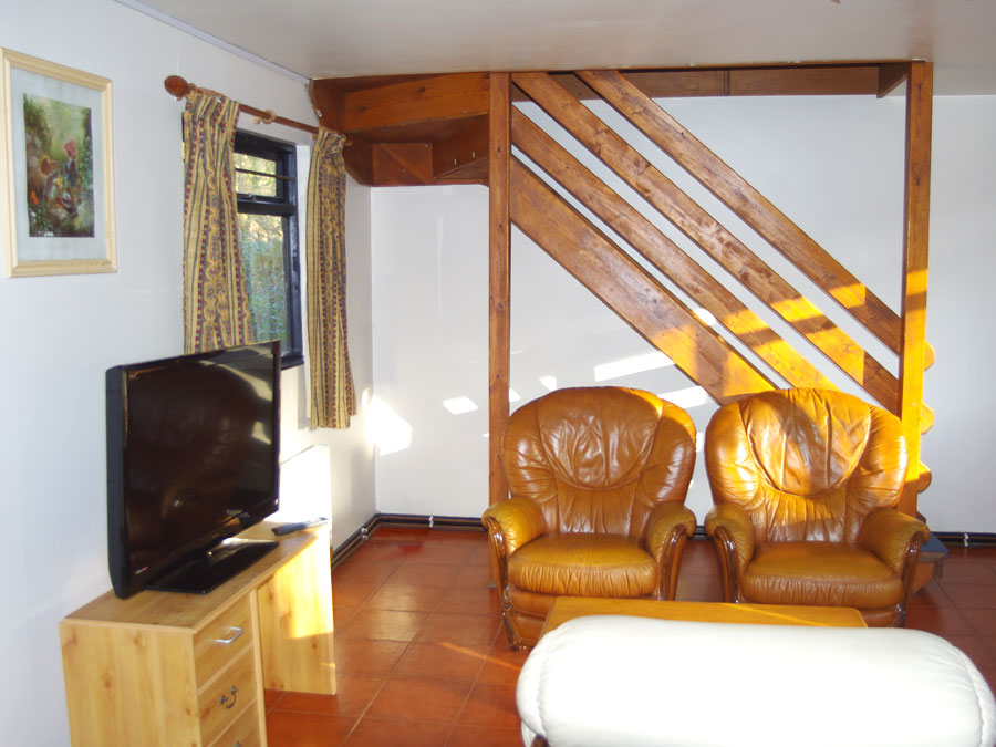 The Chalets living room, Chalet accommodation with Adventure Wales