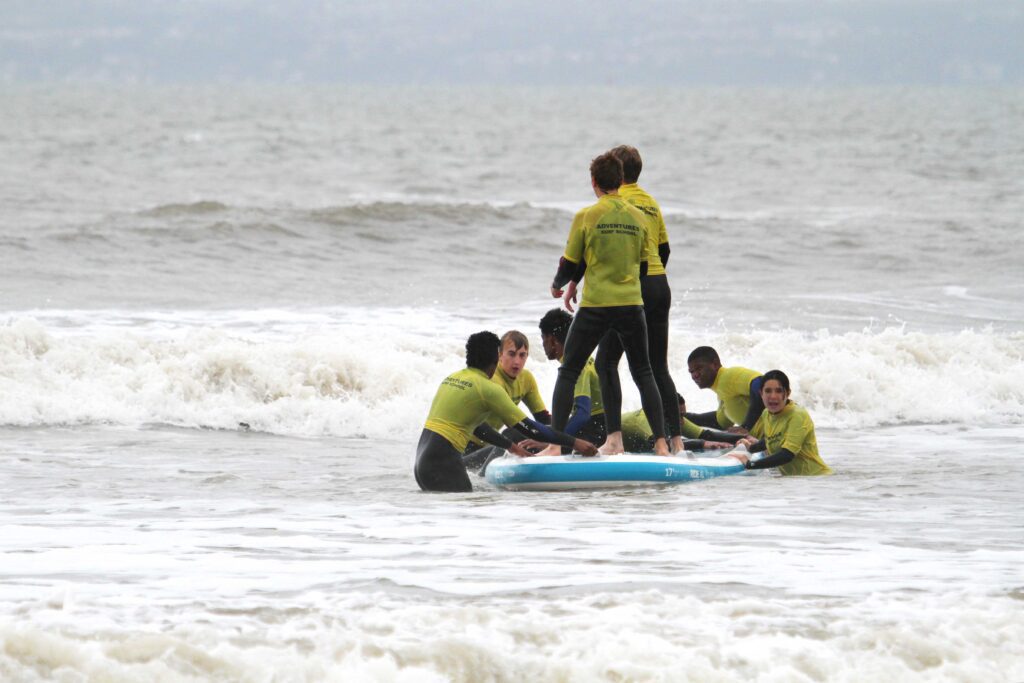 SUP/ Surfing Team Building and Stag Party in Cardiff, Swansea and Bristol, team rafting in South Wales, Team rafting in Cardiff, Sea rafting stag package, Stag party rafting, Team Surfing, Stag surfing party, surfing adventures